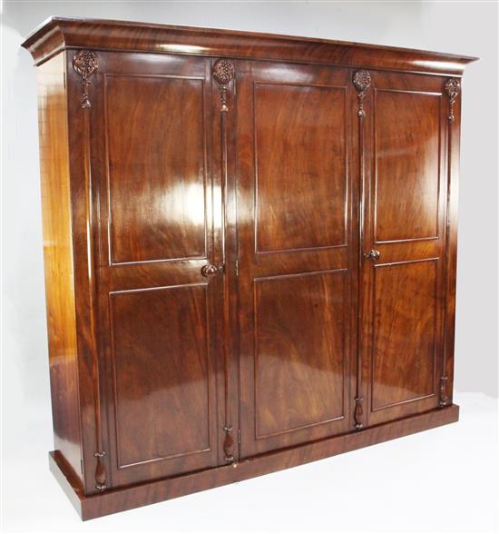 A late Victorian mahogany triple wardrobe, W.7ft 4in.